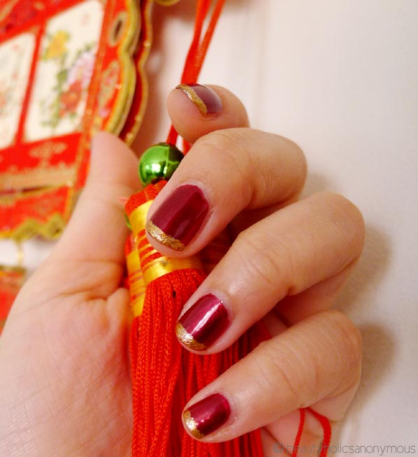 Celebrating the Chinese New Year with Red and Gold Nails